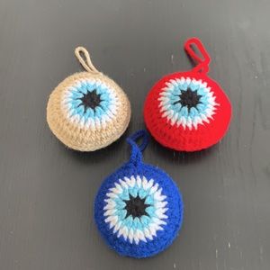 Hand crocheted evil eye ornament for Christmas tree or room decor Price is for 2